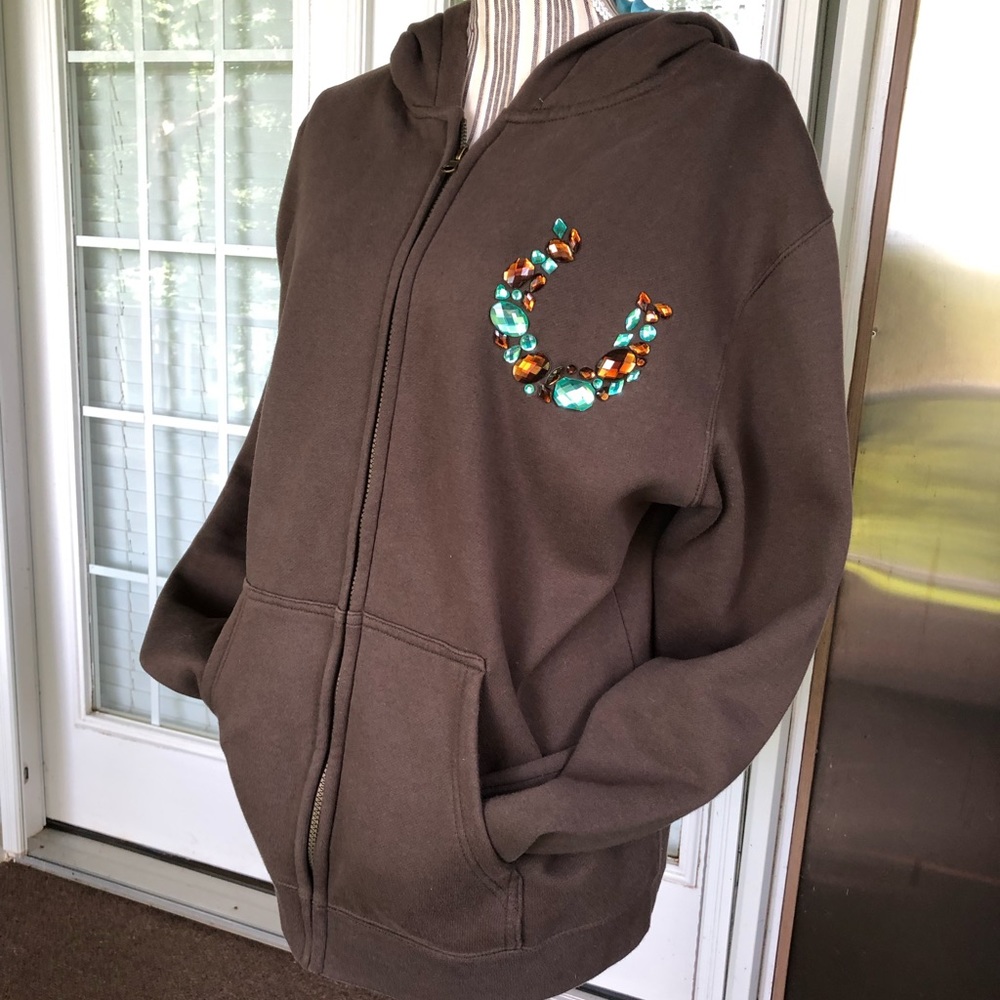 Cowgirl Hardware rhinestone horseshoe jacket.